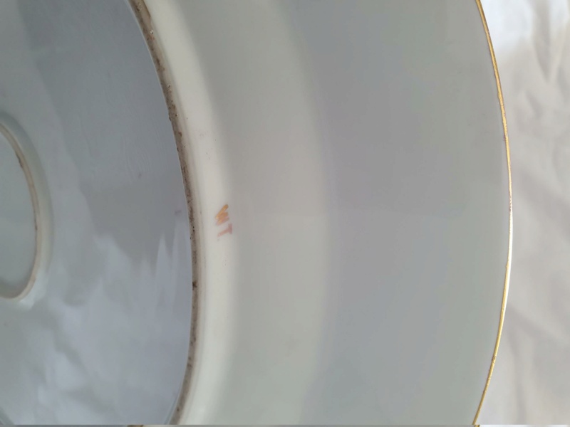 12 1/4 inch maroon gilded lustrous plate with rams or ibexes 20230514