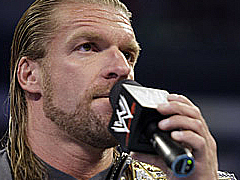 Triple H appelle The Rock Triple10
