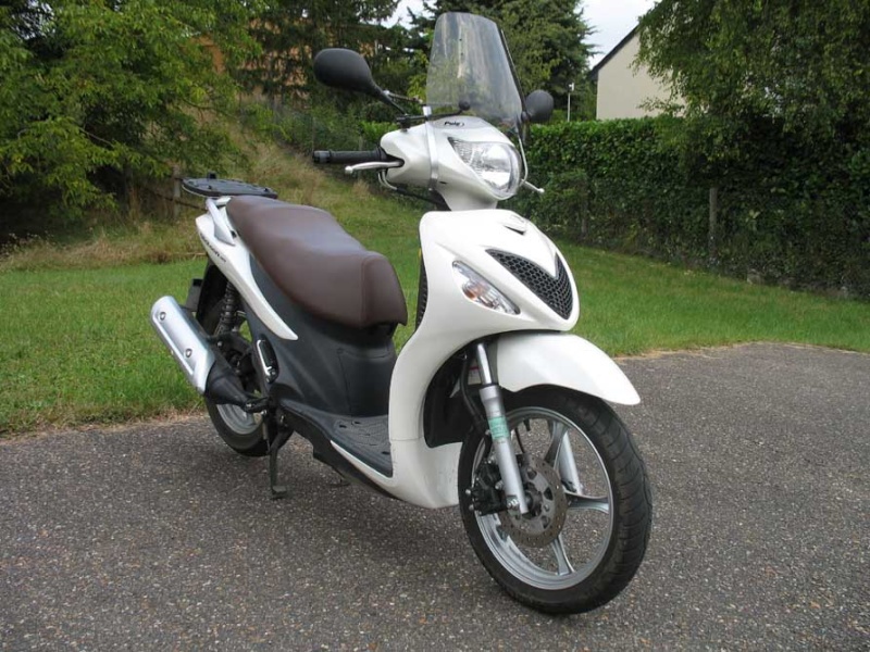 Je vends : scooter 125 Suzuki Sixteen de 2010. Img_0211