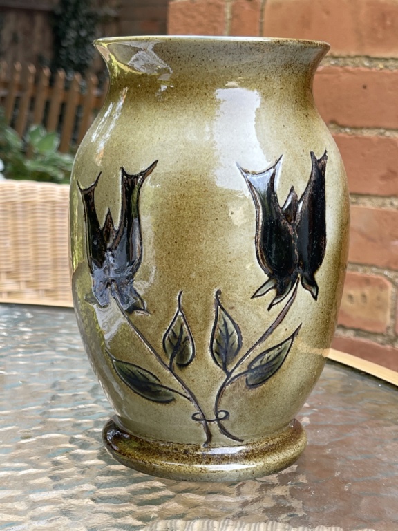Lovely pot with black tulips . Is it french ?  86d6fb10