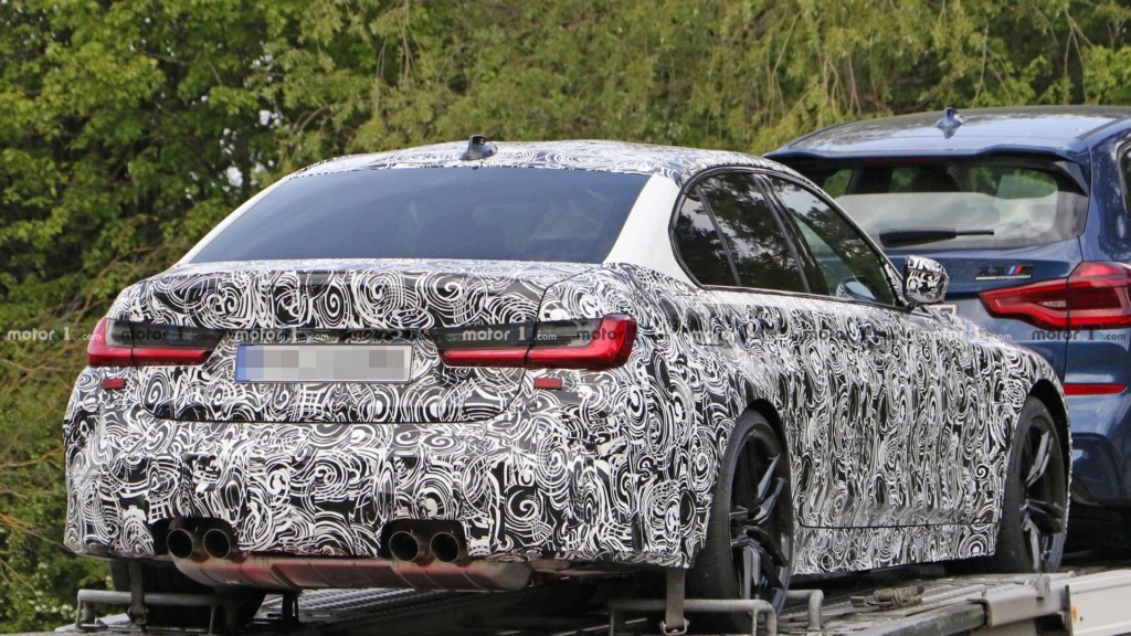 Novo BMW M3 2020 se revela por baixo em carreta 2020-b20