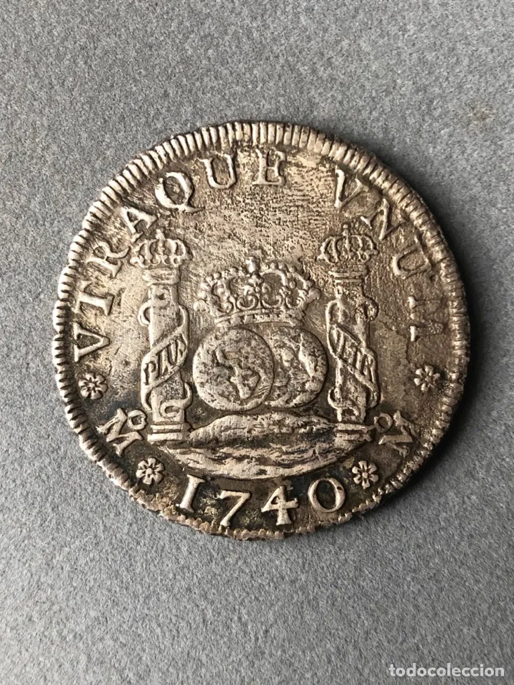 Ayuda sobre una moneda de pecio, 4 reales de Felipe V de 1740. 26032813