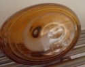 Brown bottle vase with white swirl - any ideas? Ad212
