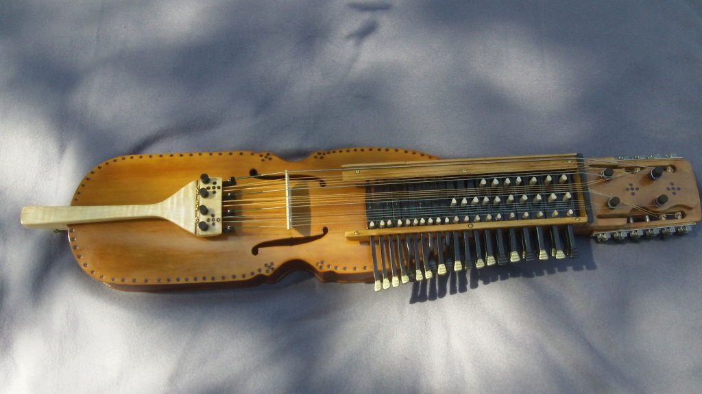 The "Nyckelharpa" a Scandinavian stringed/bowed/keyed MusicalIinstrument Nyckel10