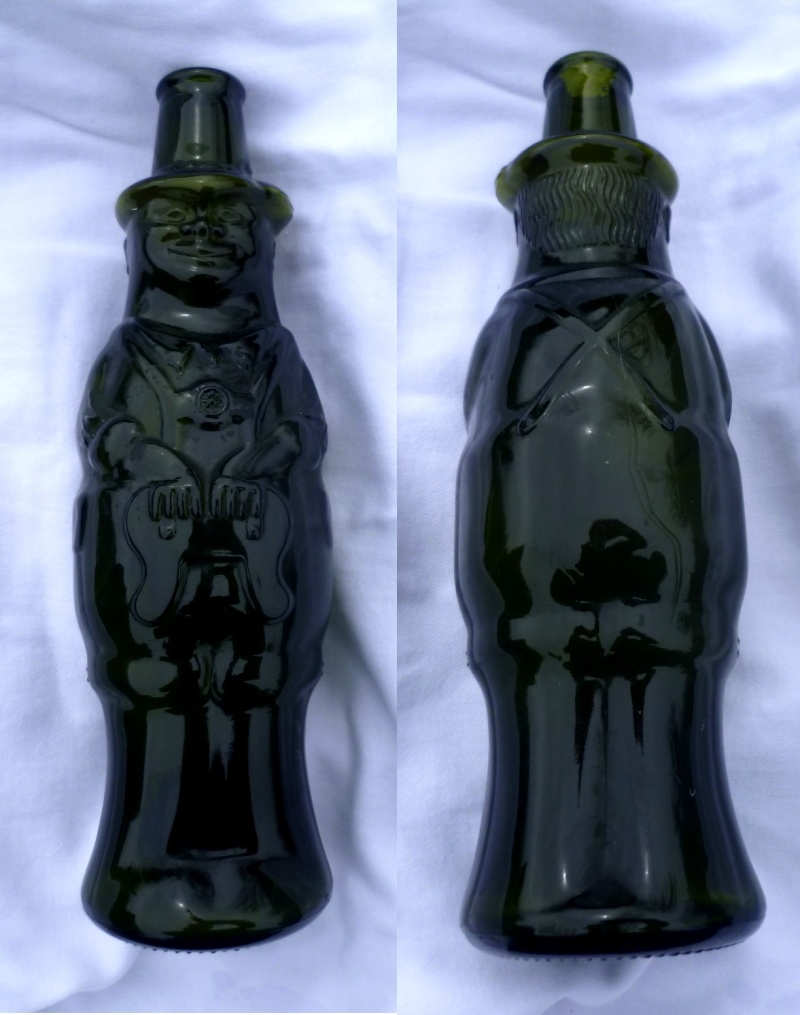 very odd looking glass bottle man - NV stamp Abc10