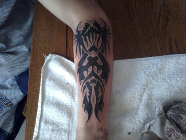 avez vous un tatouage ? si oui comment es t'il ??? Tatoo210