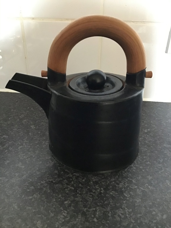 Who made this teapot?  Chris Weaver made it. 67d45210