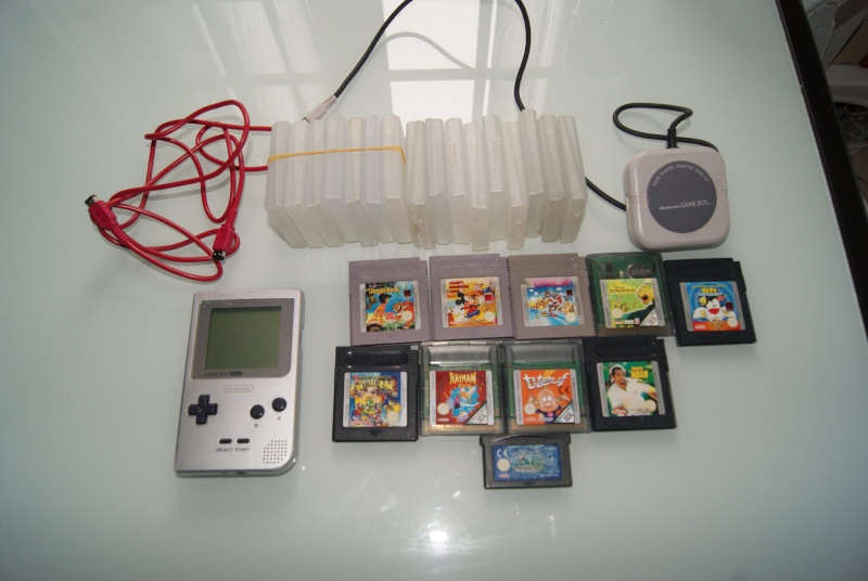 [VDS] Game Boy Pocket + 10 jeux+ 16 boitier de protection game boy ... Dsc01736