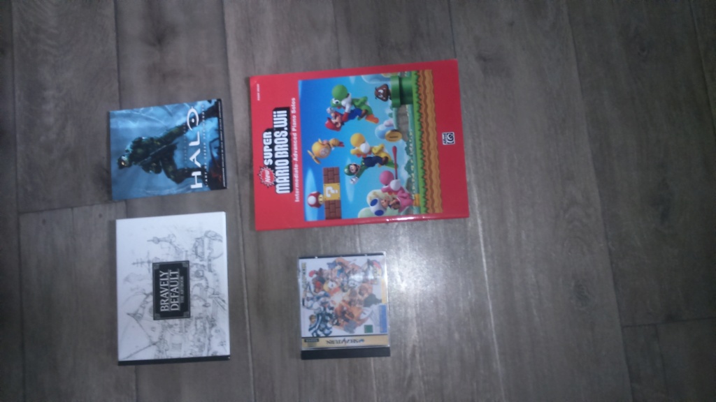 ech inserts boite console saturn 2 jap , notice sega nin sony xcrote livre de préco ect du cancre Dsc_0449