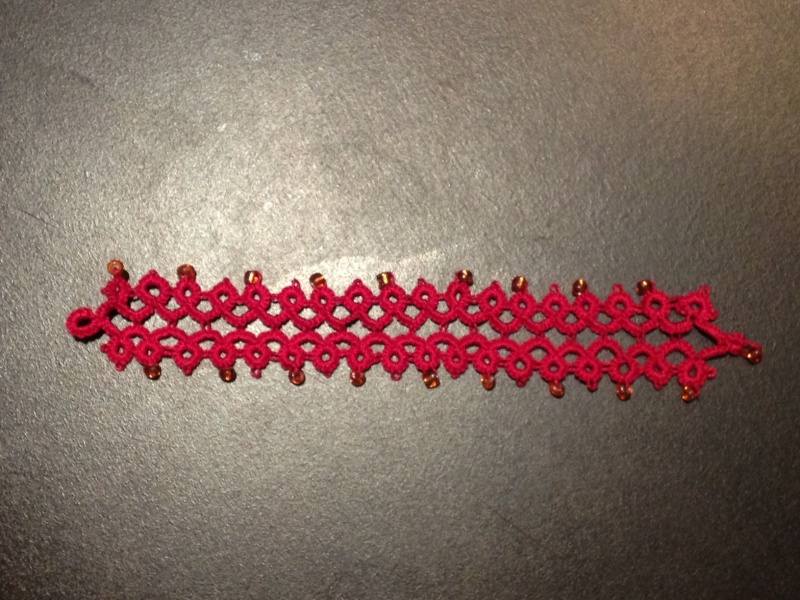 Bracelet rouge pour Minette Bracel10