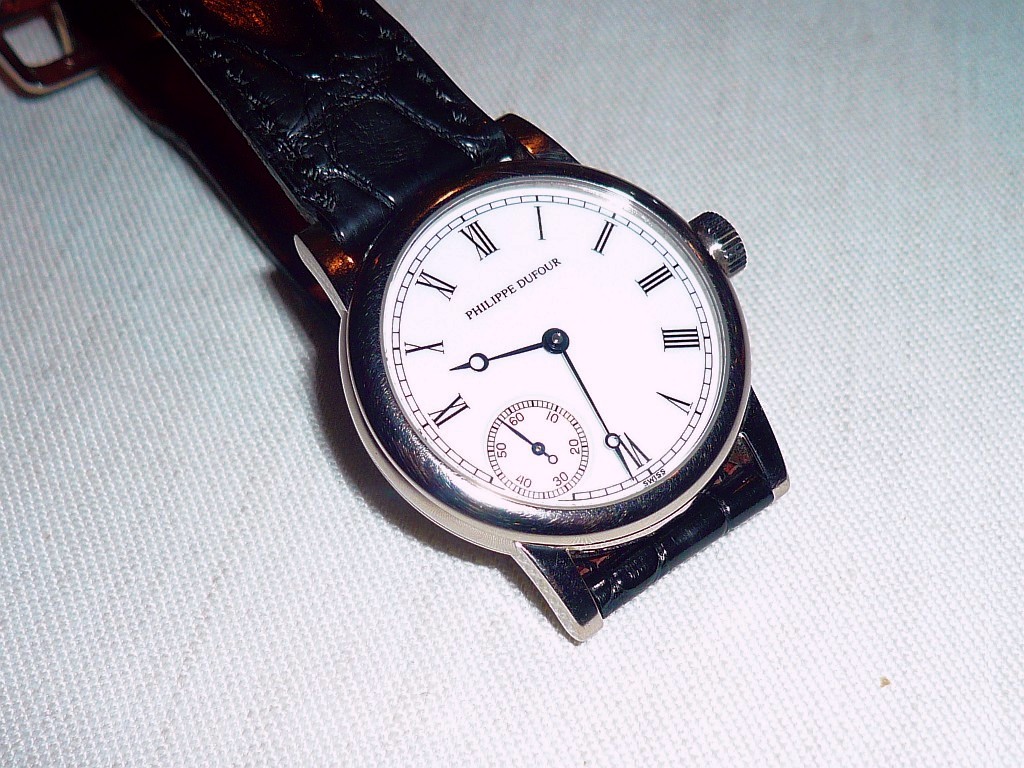 Et des photos pas terribles d'une montre TRES rare Geneva14