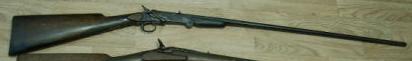 Alguem sabe a marca desta arma? Flober10