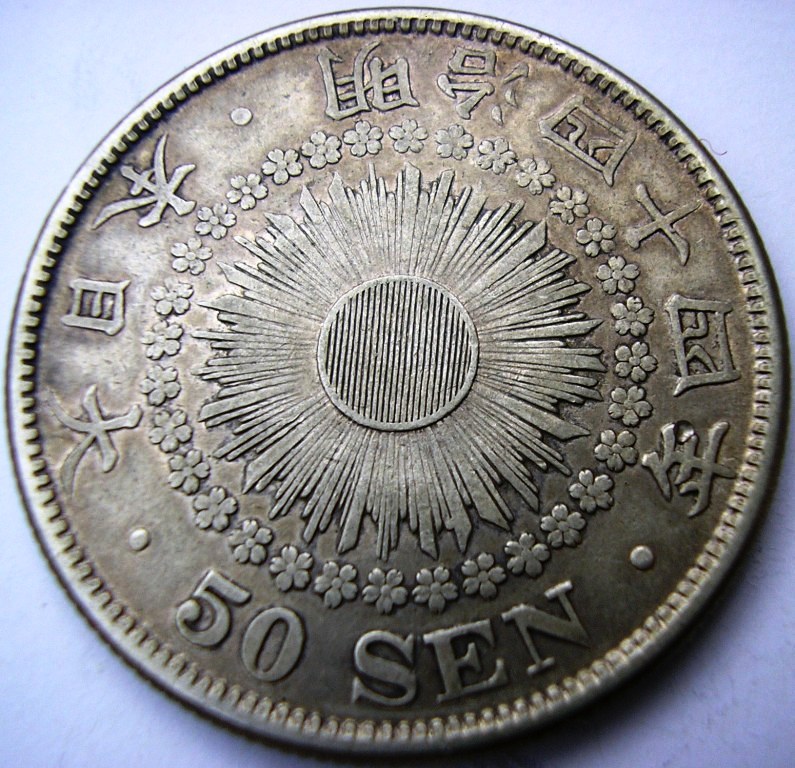 Mas entretenido que los crucigramas, es fechar algunas monedas. Japon_10