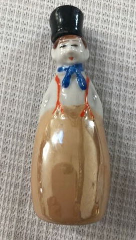 Petite Fiole, bouteille, personnage 1930 en biscuit en forme de personnage hollandais Capt3069