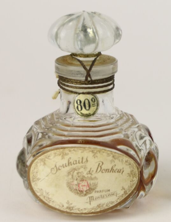 Flacon verre rodé qui sent le parfum bon marché Capt3871