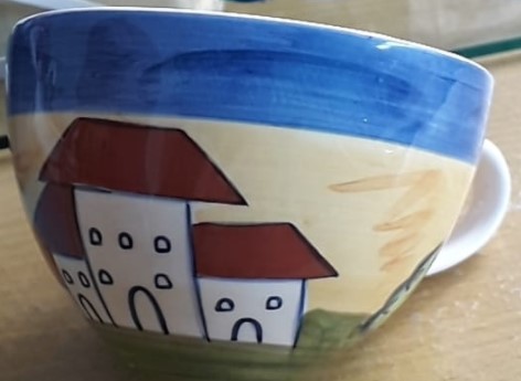 Who made this cup with 43 on its base? Cup_wi11