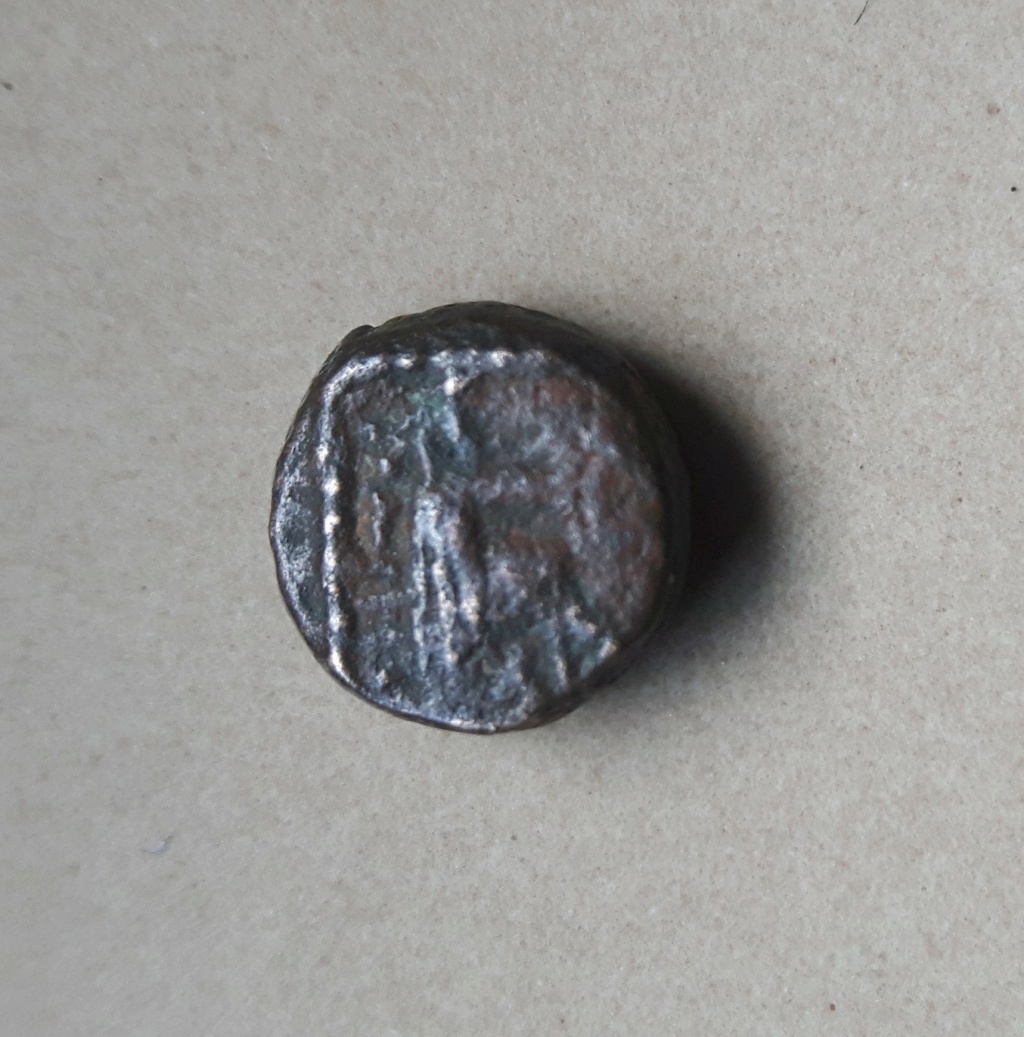 Pour identification de ce qui ressemble à une monnaie Parthe ?  Revers13