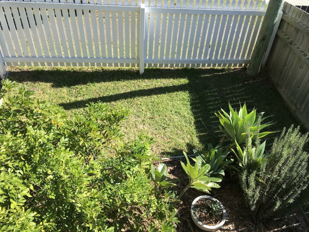 A square foot garden in a round bed.  E7070410