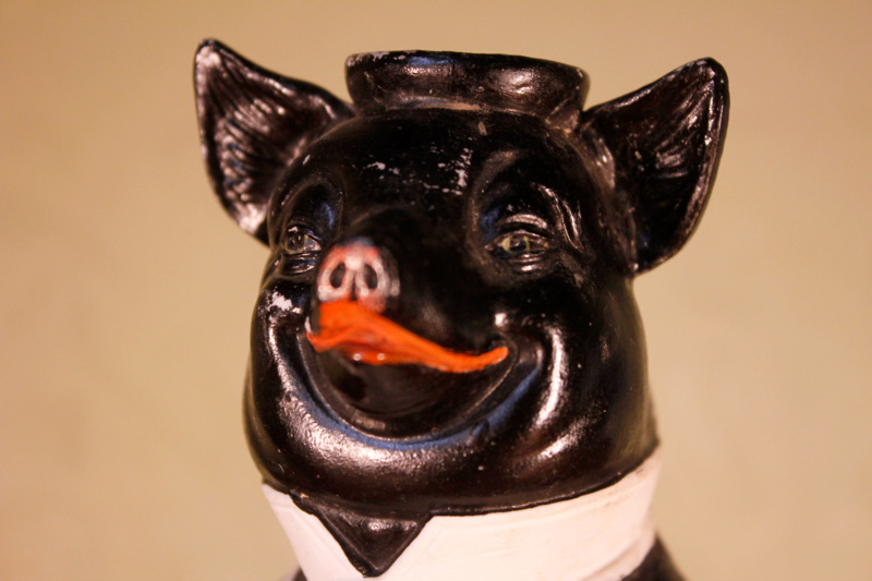 Unusual Old Bisque Black Pig with Knife Candlestick / Match holder? P1010