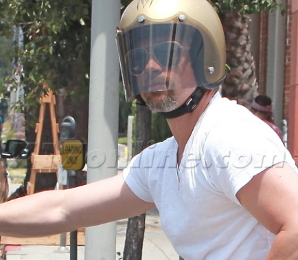 7/21/09 Brad Pitt on his motorbike visiting Aaron Sorkin U6776u10