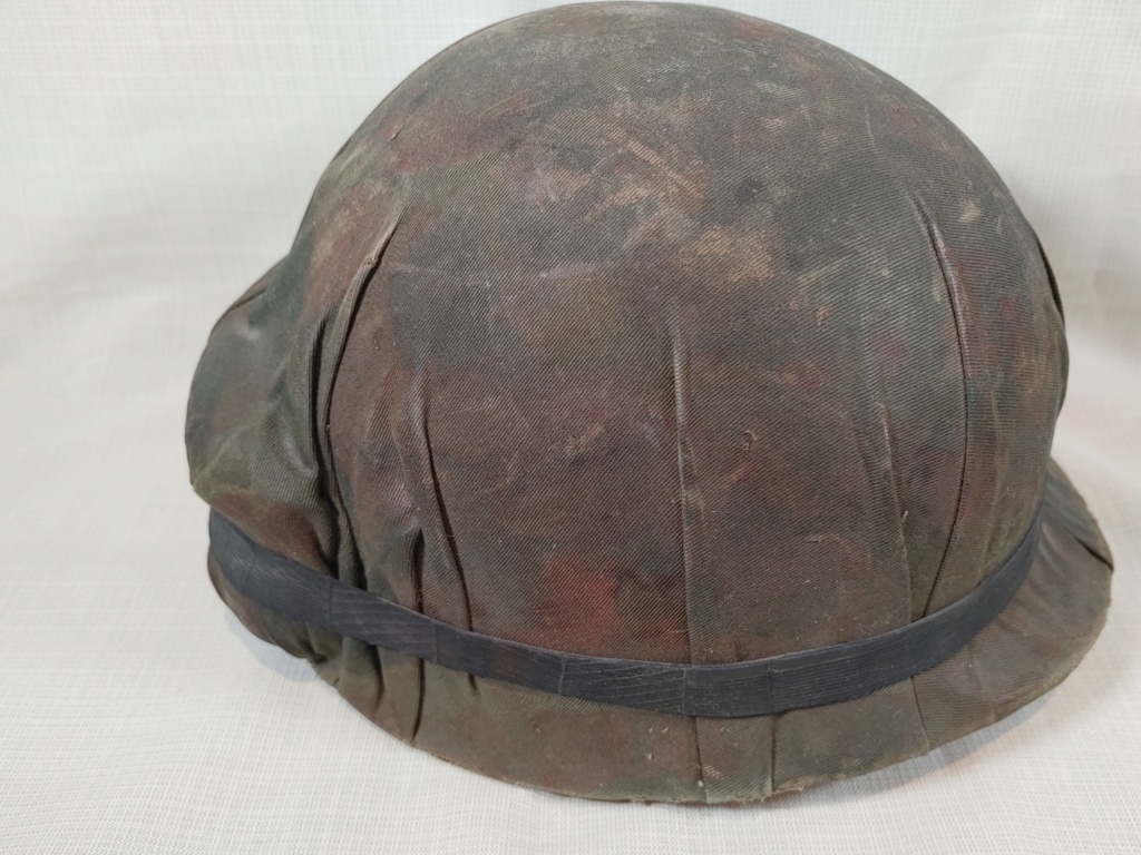 M1 helmet.  Possible Canadian, looking for help with mystery cover 20231013