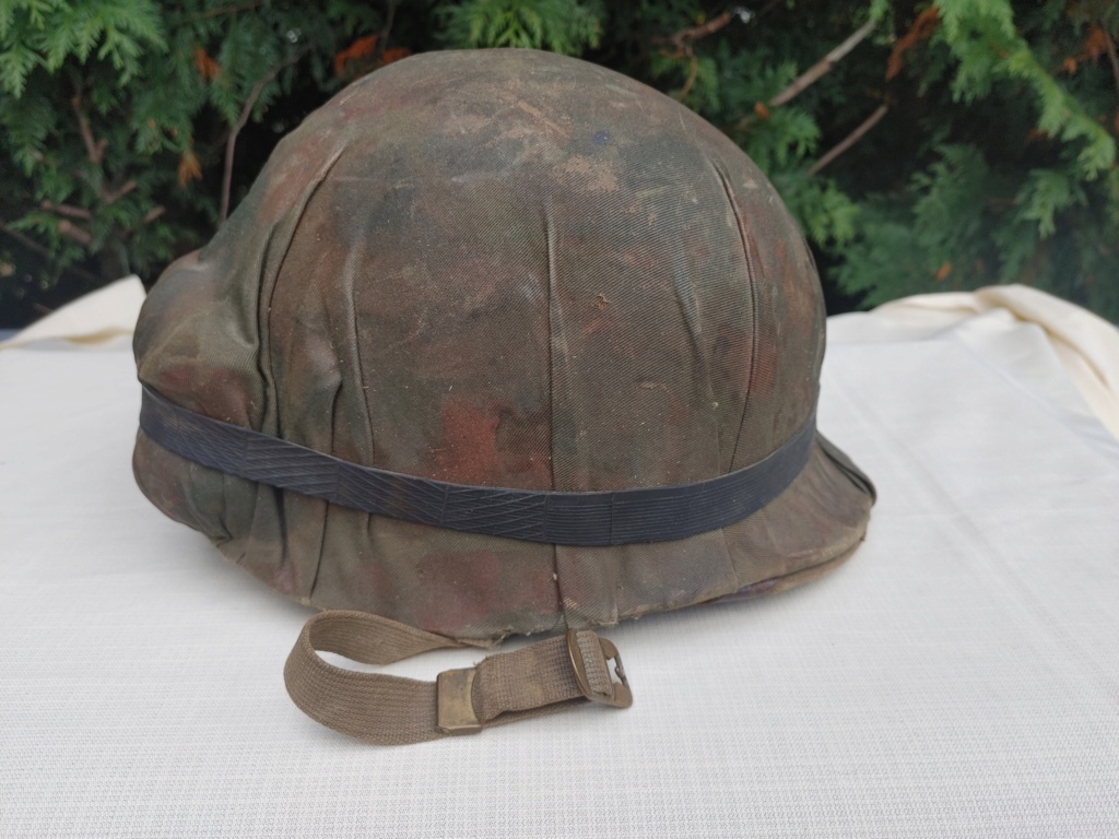 M1 helmet.  Possible Canadian, looking for help with mystery cover 20231014