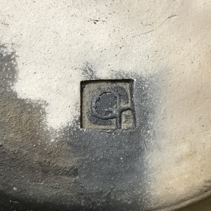 Mystery mark on a black and white pot Img_5113