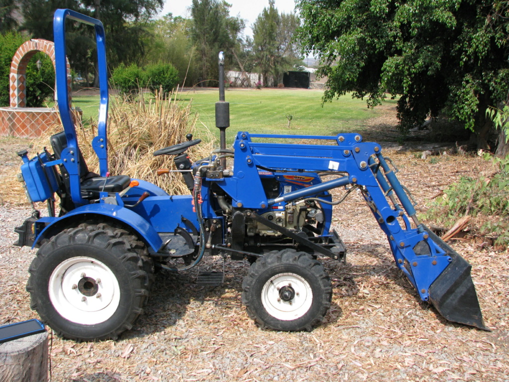 Small Tractor with front loader and rear wing plow T110