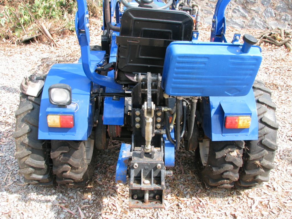 Small Tractor with front loader and rear wing plow T610