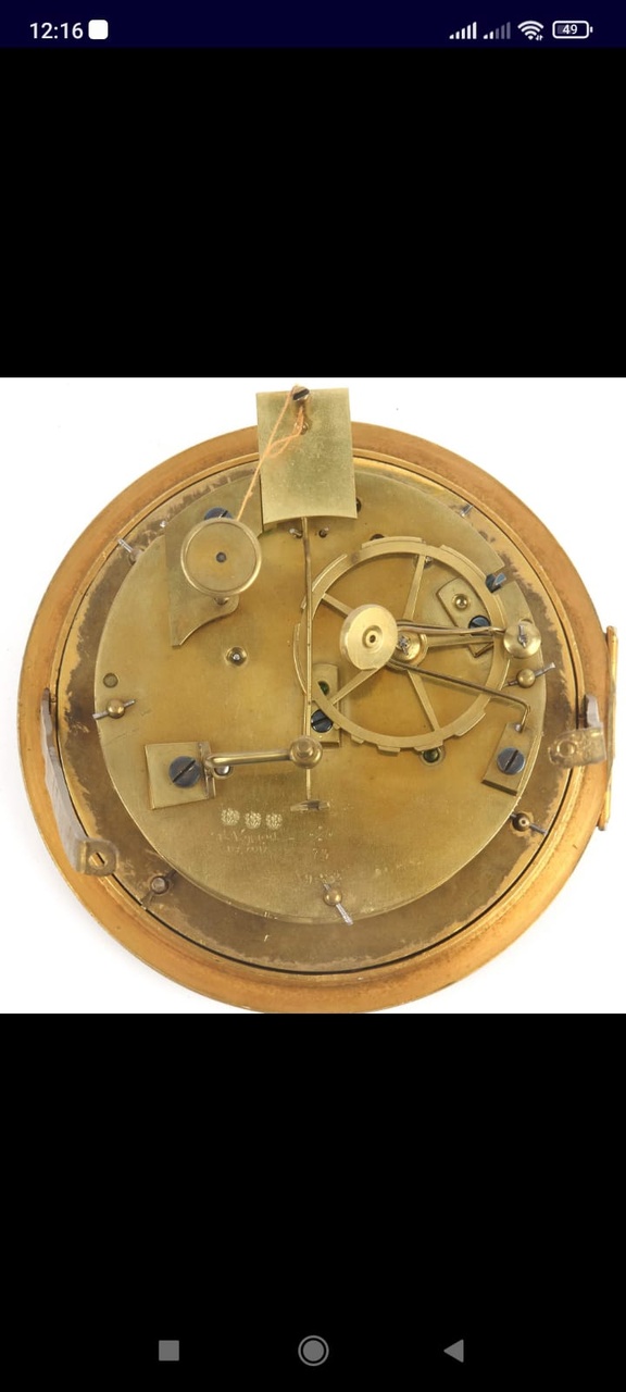 Est-ce une fausse ou une vraie horloge antique? 77510