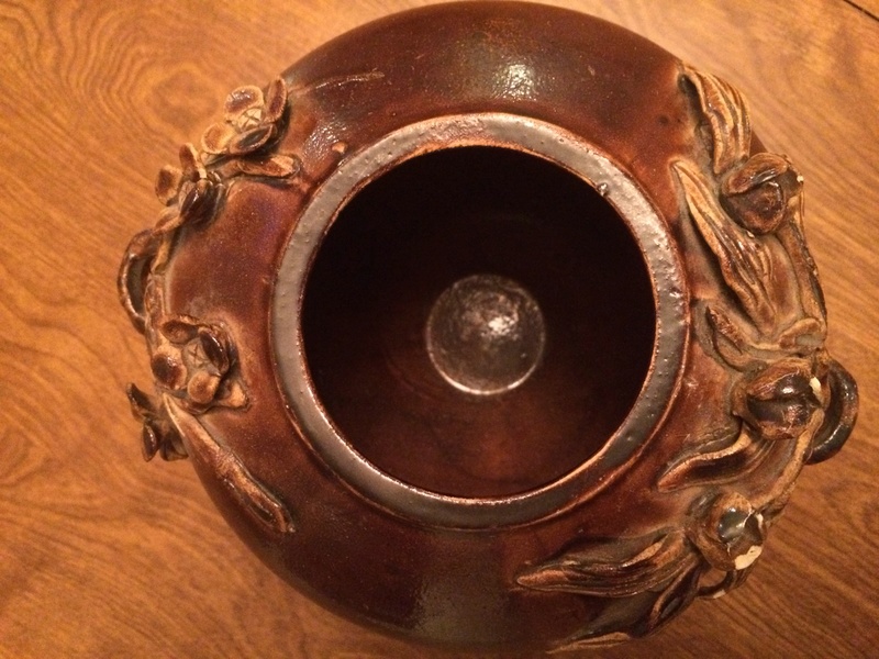 Help ID brown pottery with raised flowers Image12