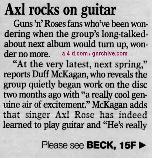 1996.07.28 - St. Cloud Times - Axl rocks on guitar (Duff) 1996_023