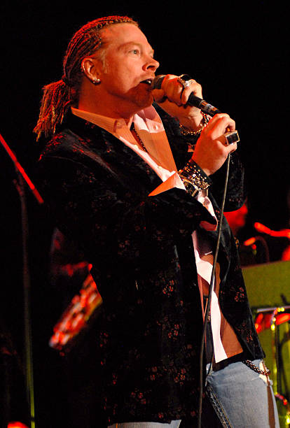 2006.11.13 - People Magazine - Michael J. Fox Rocks with Sheryl Crow, Axl Rose at Fundraiser Gettyi11
