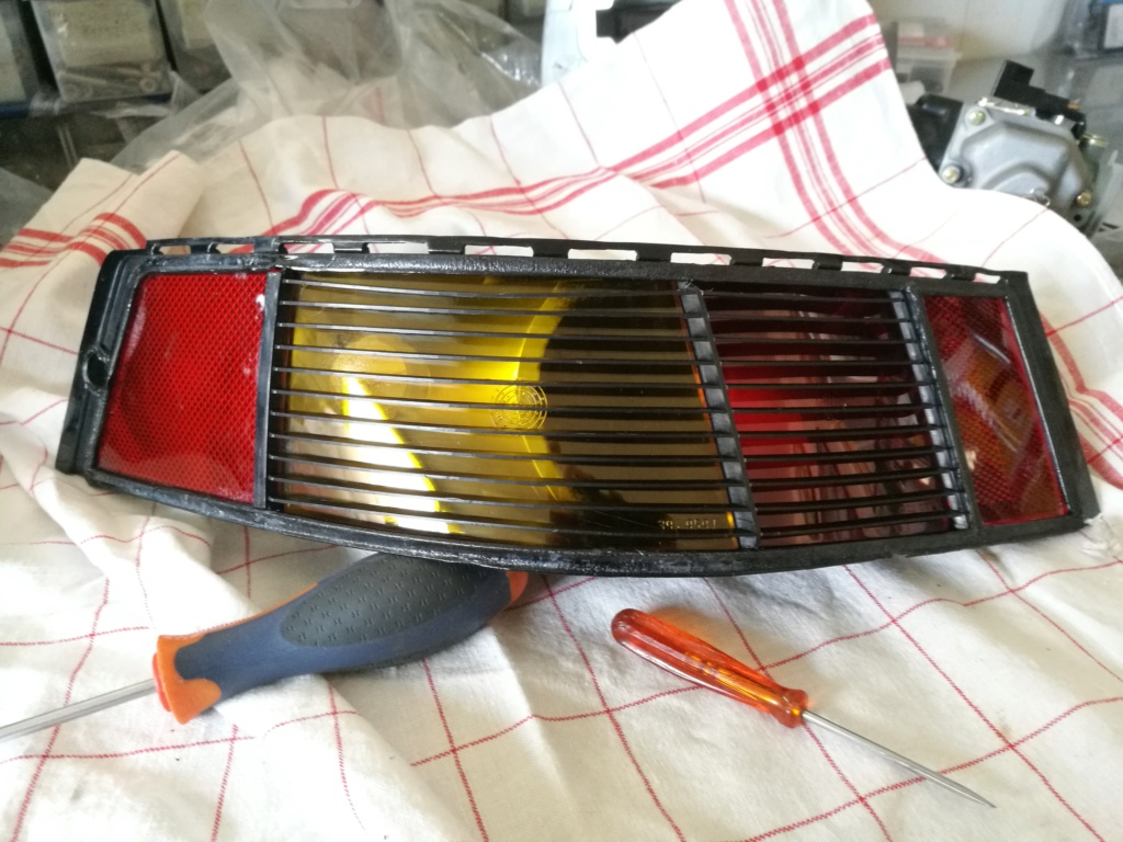 Remplacement vitres de feux AR 964. 1124