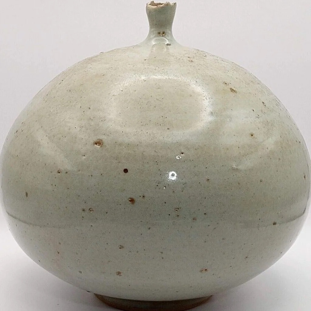 Bulbous pottery with small rough mouth and incised sailboat M2428715